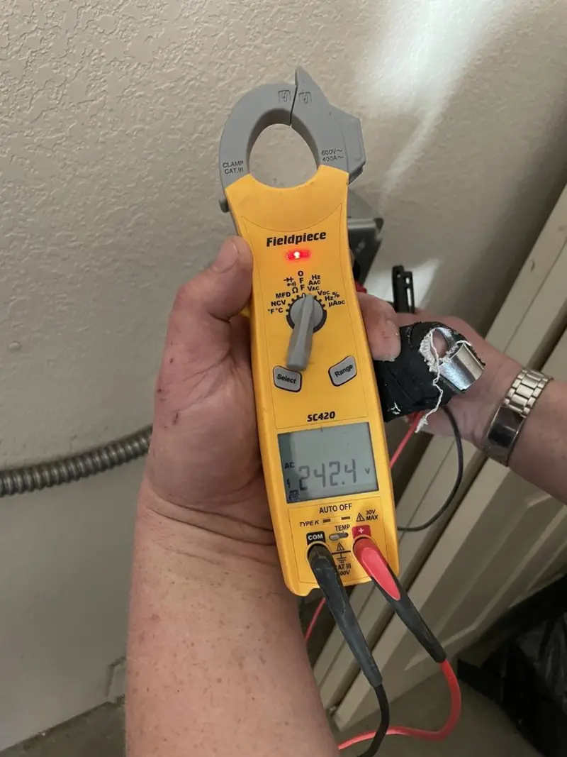 Voltage testing with clamp meter during Electrical Installation Services in Rosamond